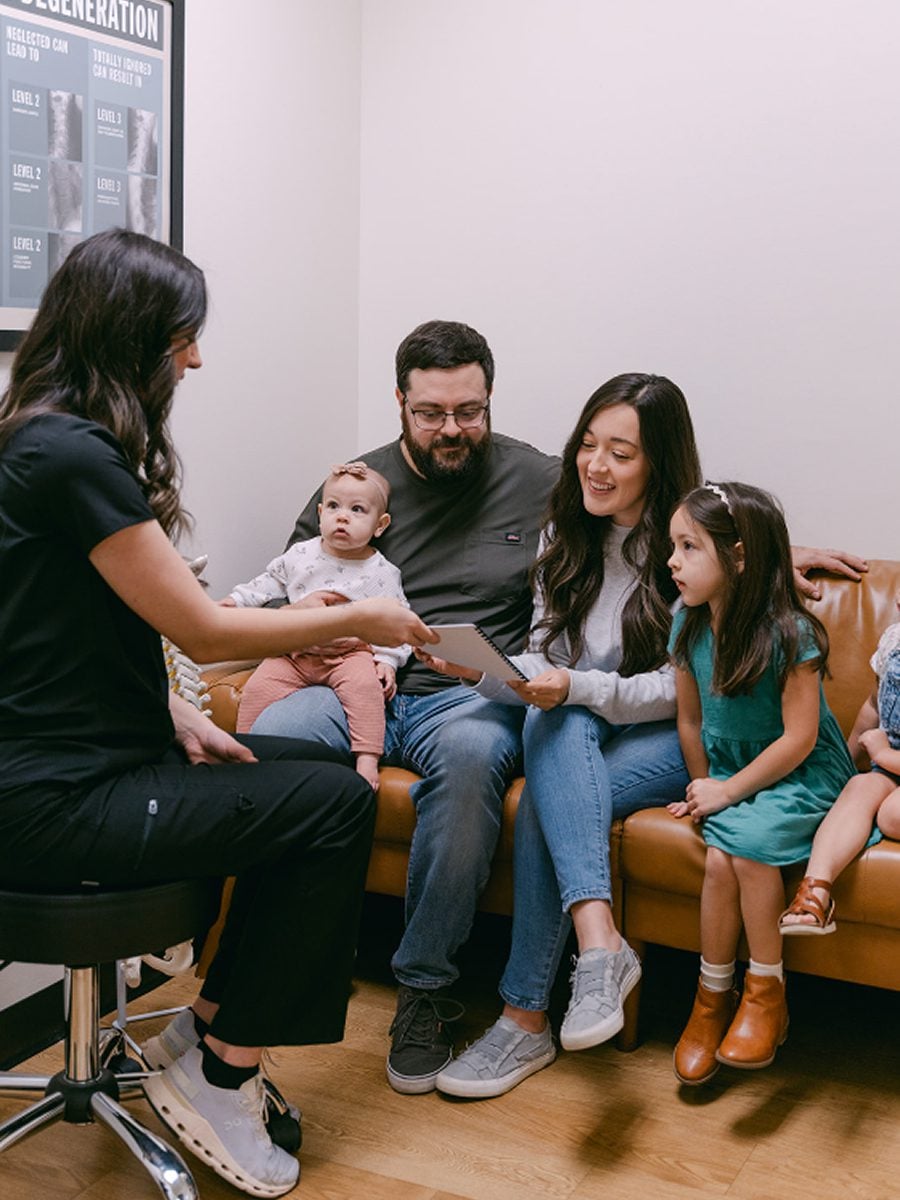 A Landmark team member reviewing findings with a family